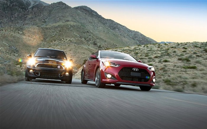 2013-Hyundai-Veloster-Turbo-2012-Mini-Cooper-S-Clubman-Hampton-front-end-in-motion-2